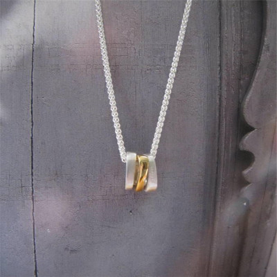 Silver Ovals Necklace With Gold Accents"